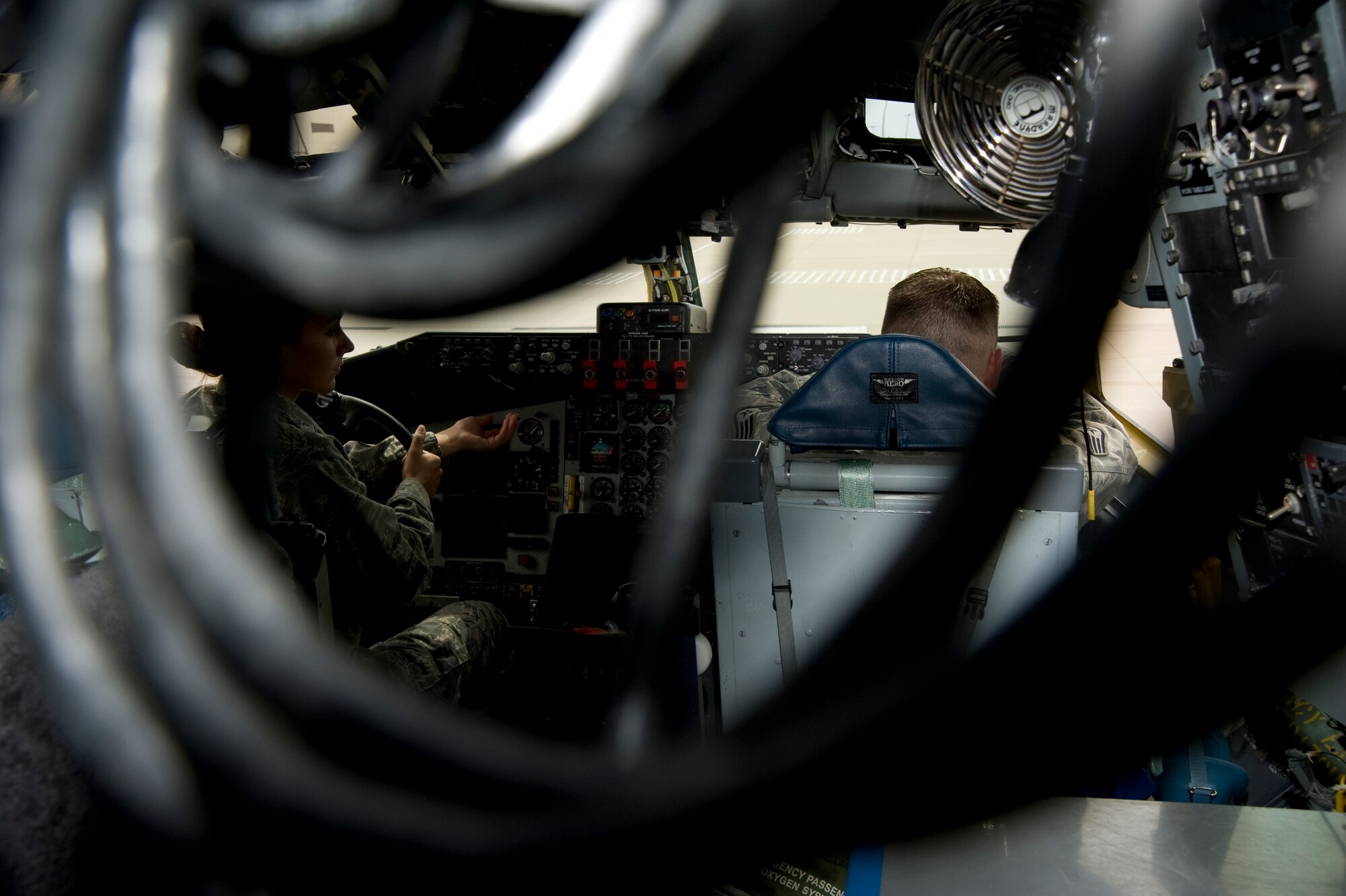 (Left to right) Capt. Carrie Kerner, 22nd Aircraft Maintenance Squadron RODEO officer in charge, and Staff Sgt. Bennie Hall, 22nd Aircraft Maintenance Squadron RODEO Communication and Navigation Mission System craftsman, repair a switch on a KC-135 Stratotanker July 6, 2011, McConnell Air Force Base, Kan.  Twenty-four Team McConnell members will be competing in the 2011 Air Mobility Command RODEO.  For more than two months McConnell’s maintainers have been preparing for the competition.  (U.S. Air Force photo/Airman 1st Class Armando A. Schwier-Morales)