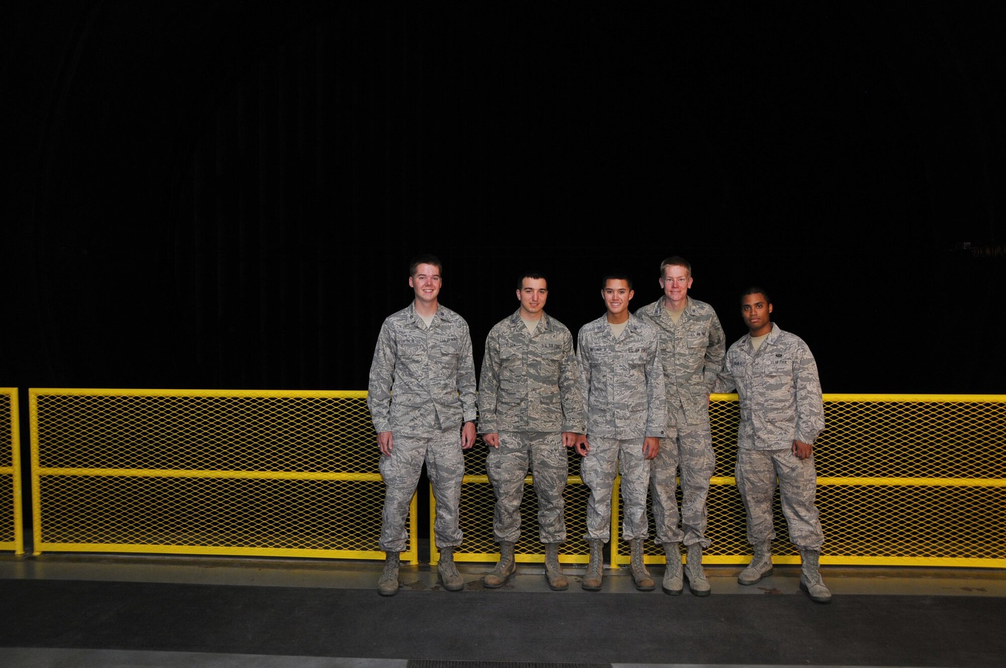 The Air Force cadets, from left, Andrew Petry, Steven Alsen, Tate Montgomery, Bryan Rhoades and Jason Black, pose for a group photo during a tour of AEDC that included a stop in the center’s 16-foot supersonic wind tunnel. (Photo provided)