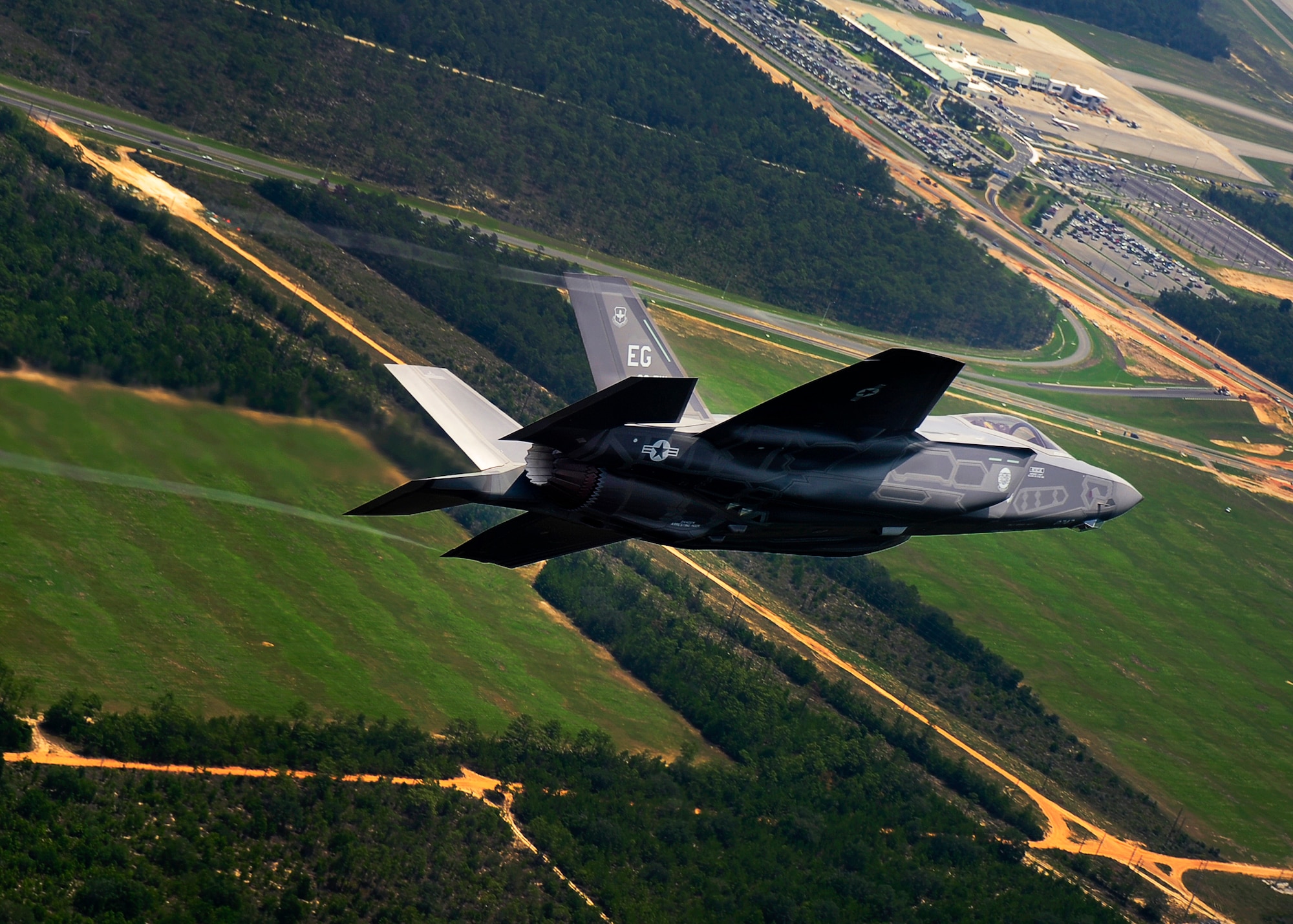 DOD’s first F-35 Lightning II joint strike fighter soars over the Northwest Florida airspace before landing at its new home at Eglin Air Force Base, July 14.  Its pilot, Lt. Col. Eric Smith, of the 58th Fighter Squadron, is the first Air Force qualified JSF pilot.  (U.S. Air Force photo/Staff Sgt. Joely Santiago)