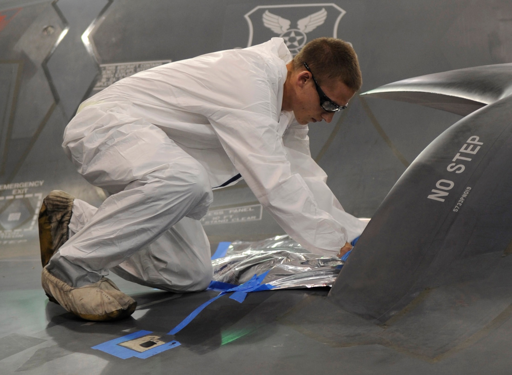 WHITEMAN AIR FORCE BASE, Mo. ? Senior Airman Kyle Miller, 509th Maintenance Squadron B-2 Spirit LO structural maintenance technician, repairs the external coating on the B-2 here July 8. More than 200 personnel, including Department of Defense civilians, contract civilians, 131st Bomb Wing Air National Guard employees and 509th Bomb Wing active-duty Airmen design, repair, modify and fabricate the B-2 and T-38 Talon aircraft specific parts.(U.S. Air Force photo by Senior Airman Alexandra M. Boutte) (RELEASED)