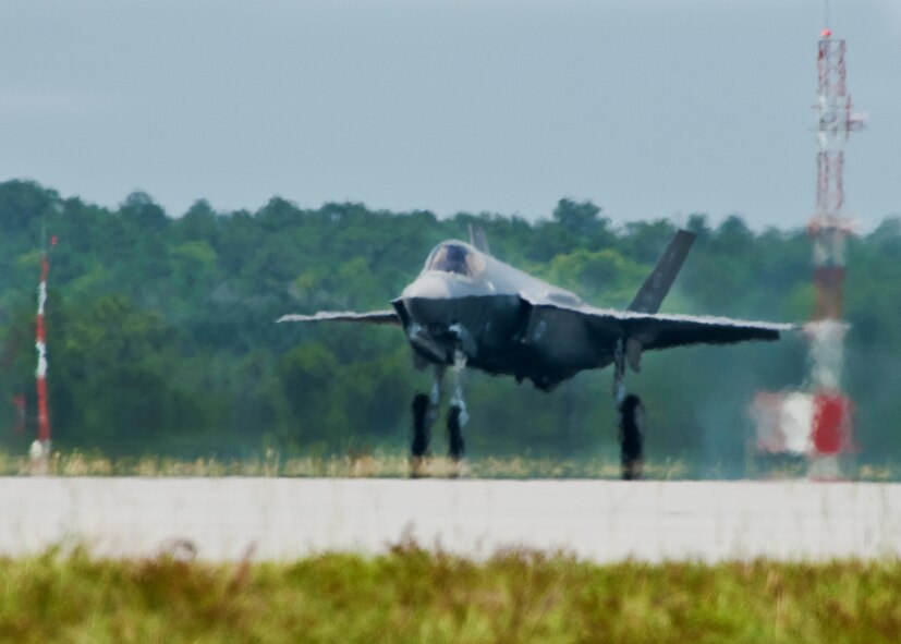 The F-35 Lightning II joint strike fighter touches down at its new home, the 33rd Fighter Wing July 14 at Eglin Air Force Base, Fla.  (U.S. Air Force photo/Samuel King Jr.)



