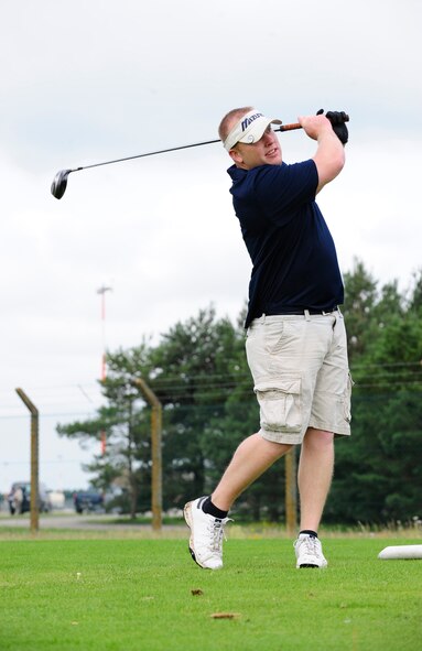 RAF MILDENHALL, England -- Brian Szarek, 100th Maintenance Squadron, drives off the 455-yard, par 5 11th hole during the RAF Mildenhall Intramural Golf play-offs at Breckland Pines Golf Club, RAF Lakenheath,  July 12, 2011. Five holes earlier, Szarek had recorded his first hole-in-one at the 120-yard par 3 sixth hole with a pitching wedge. (U.S. Air Force photo/Senior Airman Ethan Morgan)