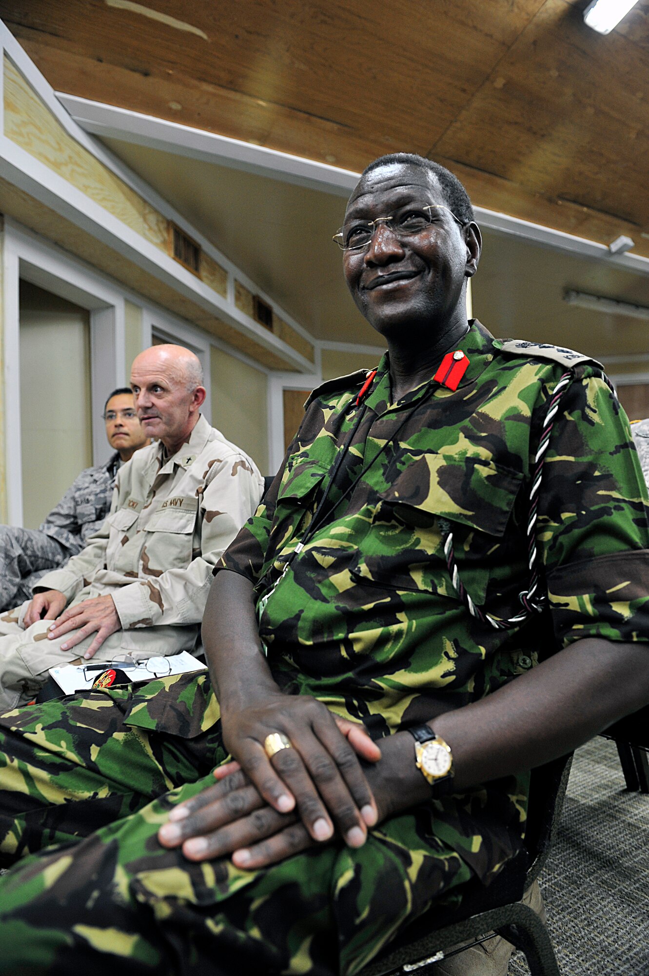 CAMP LEMONNIER, Djibouti – Kenyan Ministry of Defense Catholic Bishop (Colonel) Alfred Rotich sits in the Enduring Freedom Chapel on Camp Lemonnier during a series of familiarization briefings, July 5. Rotich and two other Kenyan chaplains visited Camp Lemonnier to exchange ideas with their U.S. counterparts and learn about the U.S. professional military chaplaincy programs. (U.S. Army Photo by Specialist Michelle C. Lawrence)