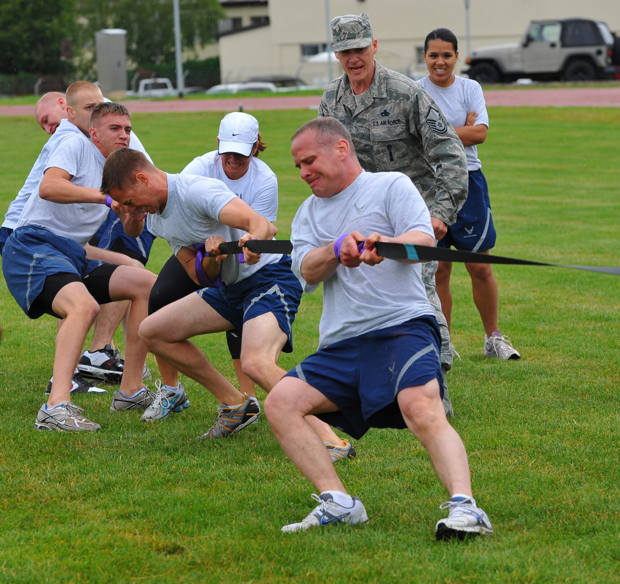 SPANGDAHLEM AIR BASE, Germany – Airmen assigned to the 52nd Force Support Squadron compete in the Iron Flight tug-of-war event against airmen assigned to the 52nd Communications Squadron here July 13. The 52nd EMS ammo team won the Iron Flight competition after a tie-breaker tug-of-war event against the 52nd Force Support Squadron. (U.S Air Force photo/Airman 1st Class Dillon Davis)