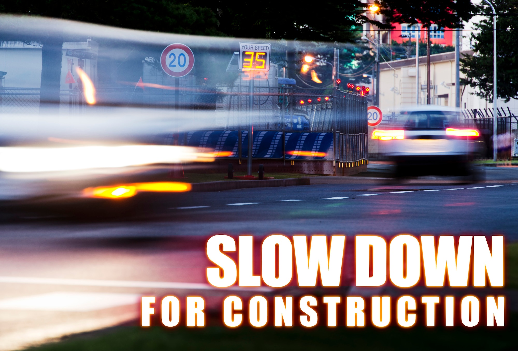 YOKOTA AIR BASE, Japan -- Yokota residents and workers are reminded to obey the 20 kph speed limit posted at all construction zones including the one on Airlift Avenue. (U.S. Air Force graphic/Staff Sgt. Samuel Morse)