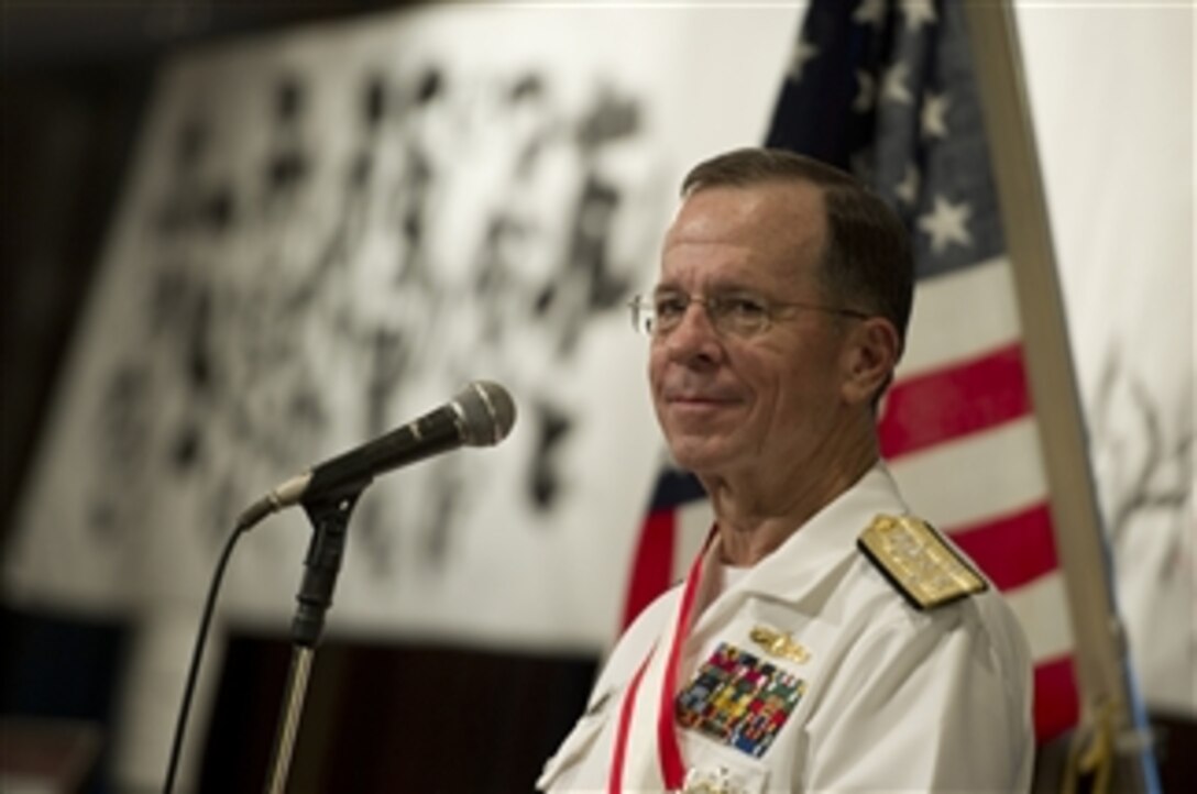 Chairman of the Joint Chiefs of Staff Adm. Mike Mullen addresses attendees at a reception honoring his visit to Tokyo, Japan, on July 15, 2011.  Mullen arrived in Japan after visiting China and Korea on a continuing Asian trip meeting with counterparts and leaders in the region.  