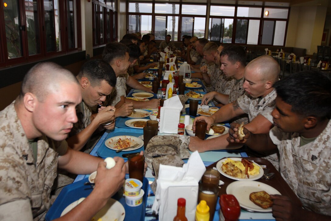 Noncommissioned officers (NCO) and petty officers (PO) with the 15th Marine Expeditionary Unit (MEU) attended a NCO and PO breakfast at the mess hall on Camp Del Mar, July 15. Col. Scott D. Campbell, commanding officer, 15th MEU, and Sgt. Maj. Richard D. Cunningham, sergeant major, 15th MEU, brought the servicemembers together to address any questions or concerns the NCO’s and PO’s may have in regards to leadership, mentoring, and their upcoming deployment.