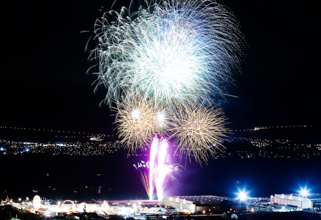 A barrage of colorful fireworks light up BayFest 2011 at Hangar 101 on Marine Corps Base Hawaii, July 15, 2011. Celebrating its 22nd year as Hawaii’s largest summer music festival, the three-day event — sponsored by Marine Corps Community Services — opened the base’s gates to the local community, featuring concerts by Cecilio and Kapono, Hoobastank, Puddle of Mudd and Joe Nichols, in addition to contests, carnival rides, food booths and military static displays.
