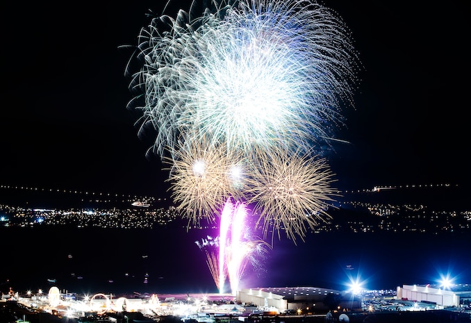A barrage of colorful fireworks light up BayFest 2011 at Hangar 101 on Marine Corps Base Hawaii, July 15, 2011. Celebrating its 22nd year as Hawaii’s largest summer music festival, the three-day event — sponsored by Marine Corps Community Services — opened the base’s gates to the local community, featuring concerts by Cecilio and Kapono, Hoobastank, Puddle of Mudd and Joe Nichols, in addition to contests, carnival rides, food booths and military static displays.