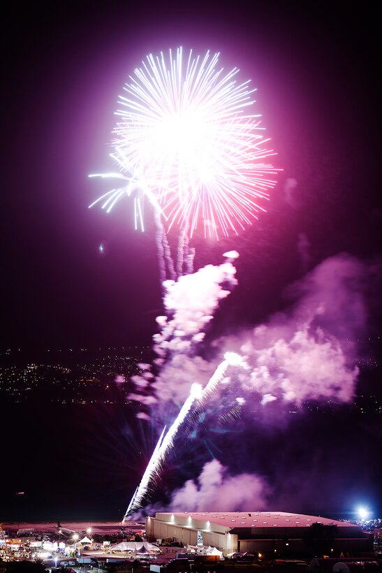 A barrage of colorful fireworks light up BayFest 2011 at Hangar 101 on Marine Corps Base Hawaii, July 15, 2011. Celebrating its 22nd year as Hawaii’s largest summer music festival, the three-day event — sponsored by Marine Corps Community Services — opened the base’s gates to the local community, featuring concerts by Cecilio and Kapono, Hoobastank, Puddle of Mudd and Joe Nichols, in addition to contests, carnival rides, food booths and military static displays.