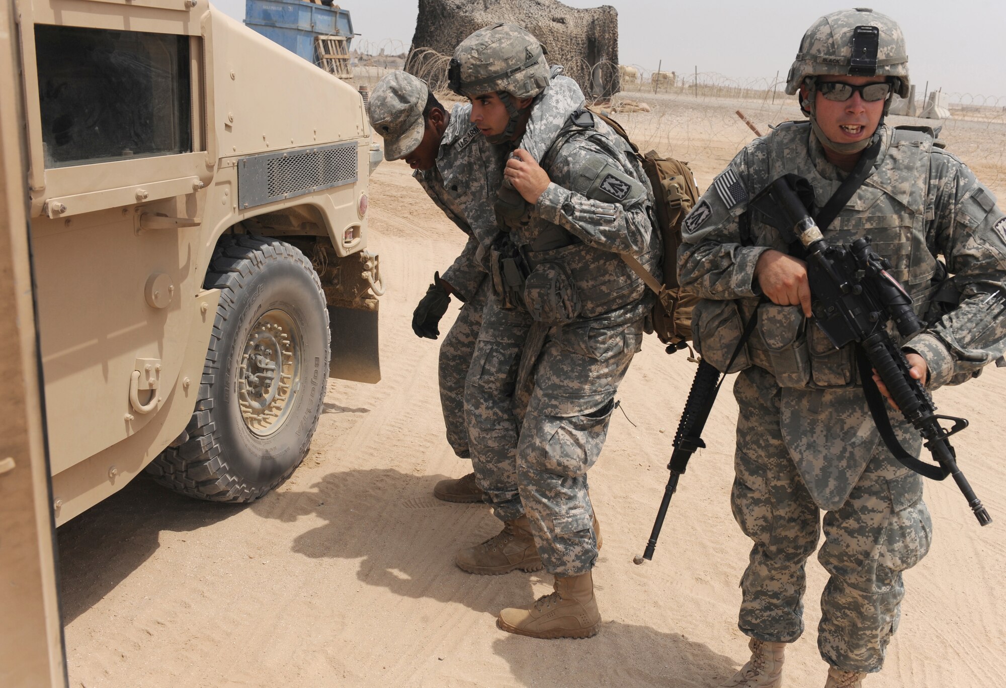 Soldiers from a quick reaction force at the 3rd Battalion, 4th Air Defense Artillery Regiment conducted a joint training exercise alongside the 380th Civil Engineer Squadron, July 15, 2011, to learn how to effectively work together during an emergency situation. (U.S. Air Force photo/Master Sgt. Chance Babin)