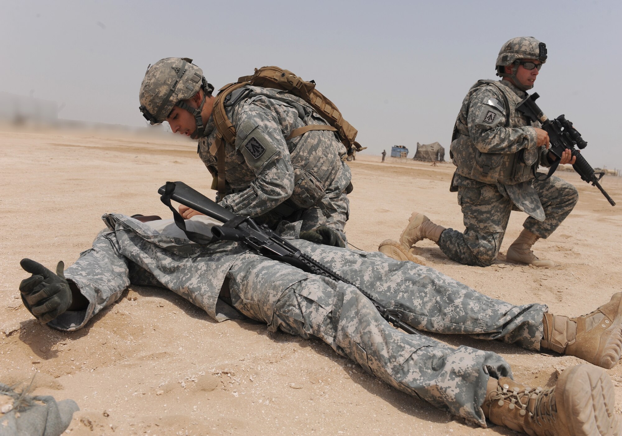 Soldiers from a quick reaction force at the 3rd Battalion, 4th Air Defense Artillery Regiment conducted a joint training exercise along side the 380th Civil Engineer Squadron, July 15, to learn how to effectively work together during an emergency situation. (U.S. Air Force photo illustration/Master Sgt. Chance Babin)