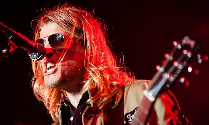 Puddle of Mudd frontman Wes Scantlin screams out lyrics during his rock band’s performance at BayFest 2011 on Marine Corps Base Hawaii, July 16, 2011. Celebrating its 22nd year as Hawaii’s largest summer music festival, the three-day event — sponsored by Marine Corps Community Services — opened the base’s gates to the local community, featuring concerts by Cecilio and Kapono, Hoobastank, Puddle of Mudd and Joe Nichols, in addition to contests, carnival rides, food booths and military static displays.