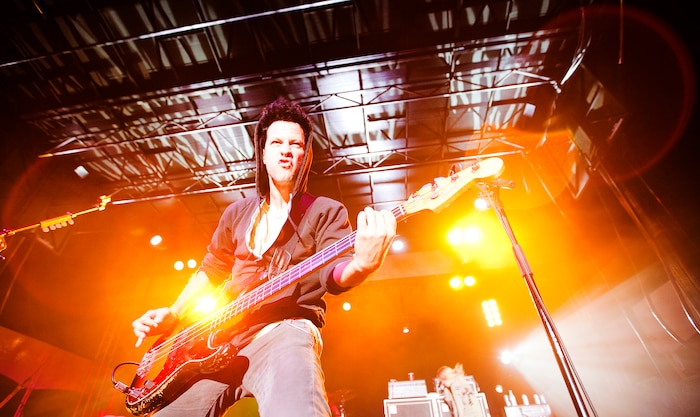 Puddle of Mudd guitarist Doug Ardito slams a face-melting guitar riff during the rock band’s performance at BayFest 2011 on Marine Corps Base Hawaii, July 16, 2011. Celebrating its 22nd year as Hawaii’s largest summer music festival, the three-day event — sponsored by Marine Corps Community Services — opened the base’s gates to the local community, featuring concerts by Cecilio and Kapono, Hoobastank, Puddle of Mudd and Joe Nichols, in addition to contests, carnival rides, food booths and military static displays.