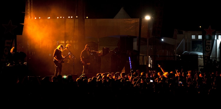 Changing pace near the end of a raucous concert, rock band Puddle of Mudd performs their song “Think” for a sea of concertgoers during their performance at BayFest 2011 on Marine Corps Base Hawaii, July 16, 2011. Celebrating its 22nd year as Hawaii’s largest summer music festival, the three-day event — sponsored by Marine Corps Community Services — opened the base’s gates to the local community, featuring concerts by Cecilio and Kapono, Hoobastank, Puddle of Mudd and Joe Nichols, in addition to contests, carnival rides, food booths and military static displays.