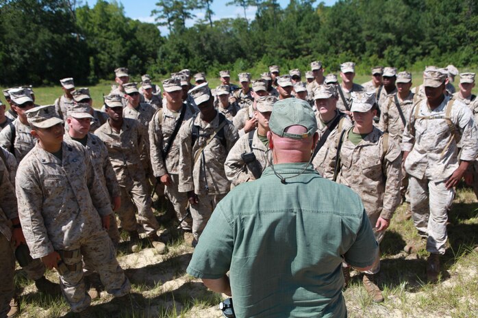 Marines with Combat Logistics Battalion 24, Combat Logistics Regiment 27, 2nd Marine Logistics Group, are trained on the processes of running an evacuation control center as part of non-combatant evacuation operation training at Landing Zone Oriole, July 16. The training served as a smaller part of a nine-day training event, July 11-20, to prepare the battalion for compositing with the 24th Marine Expeditionary Unit.