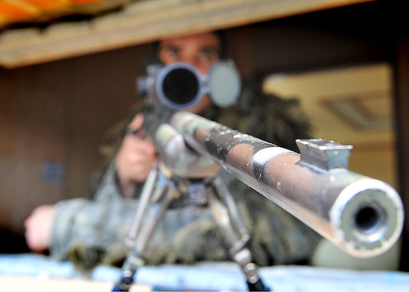 51st Security Forces Squadron and Republic of Korea Air Force members performed base defense operations training during the combat readiness course at Osan Air Base, June 26. During training, combined SF members' reacted to [simulated] hostile forces. Members were challenged with securing Base Alpha, executing troop movement maneuvers and communication tactics. Security Forces members are responsible for ensuring the safety of bases, weapons, property and personnel from hostile forces. (U.S Air Force Photo by/Staff Sgt. Daylena Gonzalez)