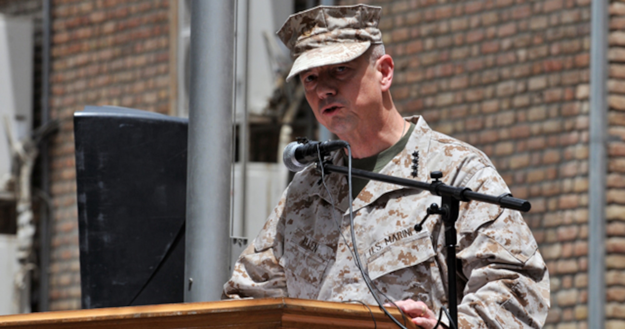 Marine Gen. John R. Allen speaks after assuming command of the NATO-led International Security Assistance Force and U.S. forces in Afghanistan during a ceremony in the Afghan capital of Kabul, July 18, 2011. Allen succeeded Army Gen. David H. Petraeus, who is retiring from the Army to serve as CIA director. (NATO photo)