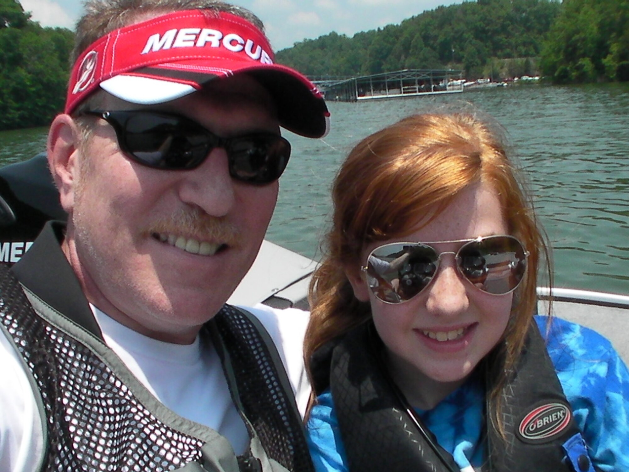 Brad McClure takes his youngest daughter, Leah, on a boat ride on Memorial Day. (Photo provided).