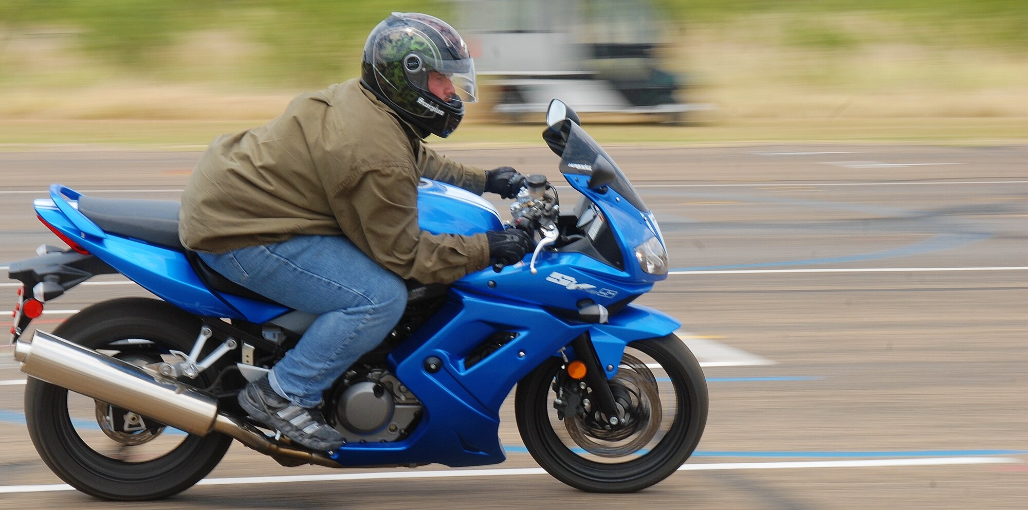GOODFELLOW AIR FORCE BASE, Texas-- Sean Maurer, 17th Logistic Readiness Squadron, speeds through one of the drills during the sports bike riding course on the old flightline here July 16. The sports bike riding course is used to teach riders to be comfortable on their vehicles in adverse situations. (U.S. Air Force photo/ Airman 1st Class Michael Smith)