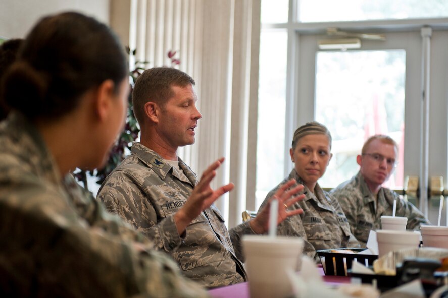 U.S. Air Force Col. Gary Henderson, 23rd Wing commander, gives remarks during lunch with various company grade officers at Moody Air Force Base, Ga., July 13, 2011. The lunch was as an opportunity for Henderson to discuss issues and concerns about today’s Air Force while mentoring the young officers and getting their opinions on certain topics. (U.S. Air Force photo by Staff Sgt. Jamal D. Sutter/Released)