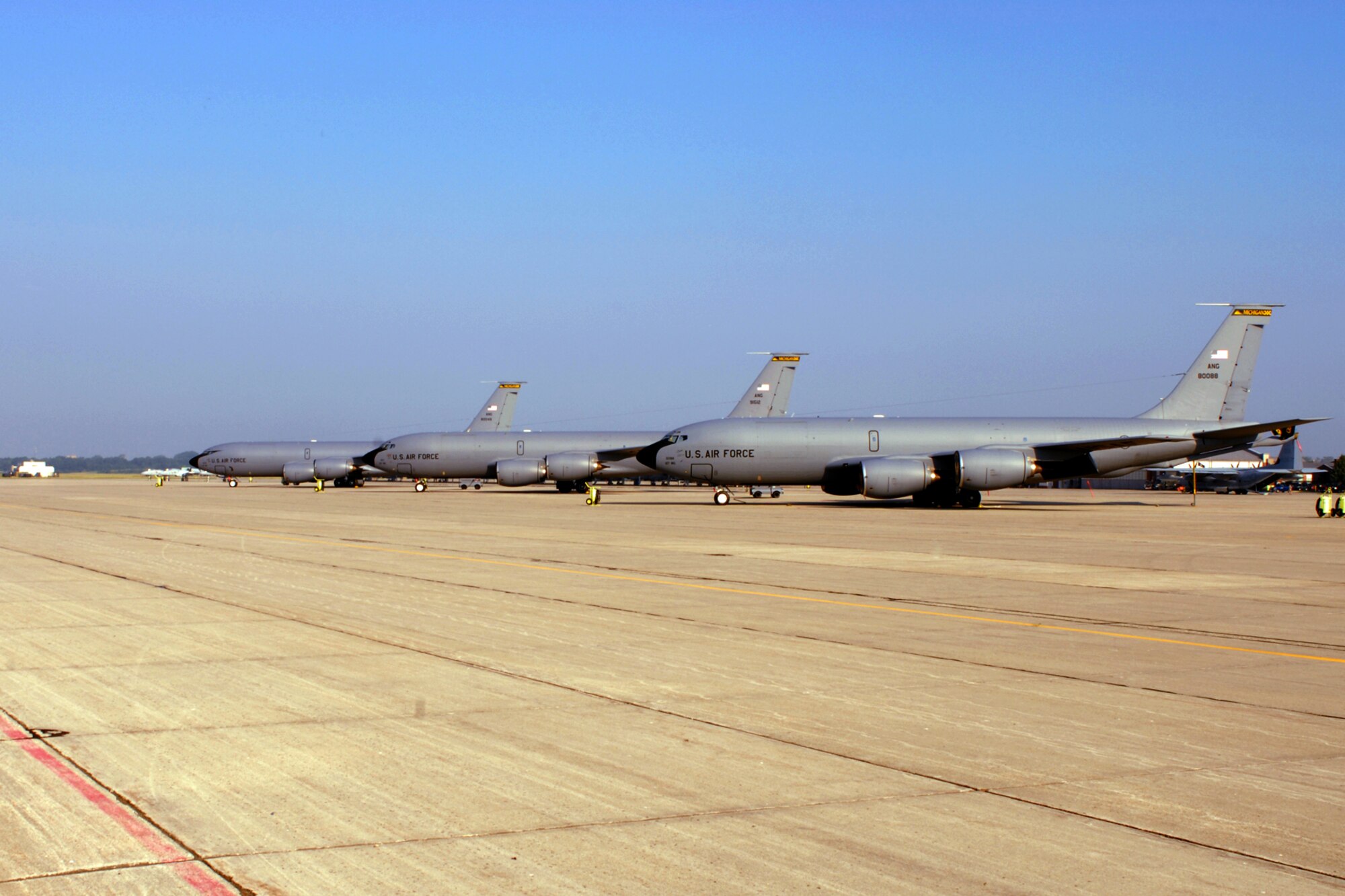 Three KC-135 Stratotankers are shown parked on the flight line at Selfridge Air National Guard Base, Mich., July 17, 2011. The Selfridge-based tankers - and the Citizen-Airmen who fly, operate and maintain them - have been away from the base on several short-term deployments in 2011, including flying operations from bases in Germany, Guam and southwest Asia supporting Operation Enduring Freedom. The tankers at Selfridge are flown and maintained by the 127th Air Refueling Group, a component of the Michigan Air National Guard's 127th Wing. The KC-135s and their crews provide a variety of aerial refueling, cargo and troop transport and aeromedical evacuation capabilities to the U.S. Armed Forces. (USAF photo by SrA Brittany Simon)
