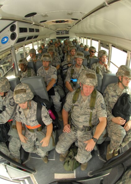 Reservists ride the bus to the wing assembly area, June 3, during the phase-one operational readiness exercise. The inspection, scheduled for August, will test the wing's ability to deploy. The 442nd SFS is part of the 442nd Fighter Wing, an A-10 Thunderbolt II Air Force Reserve unit at Whiteman Air Force Base, Mo. (U.S. Air Force photo/Staff Sgt. Danielle Wolf)
