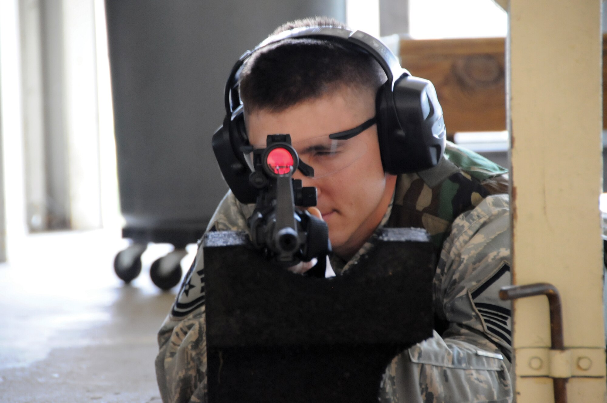 Master Sgt. Denver Long, noncommissioned officer in charge of the 442nd Civil Engineers Structures Shop, aims at his target during M-4 qualification, June 3. Sergeant Long is scheduled to deploy August 2011 with approximately 35 other CES reservists. The 442nd CES is part of the 442nd Fighter Wing, an A-10 Thunderbolt II Air Force Reserve unit at Whiteman Air Force Base, Mo. (U.S. Air Force photo/ Tech. Sgt. Kent Kagarise)