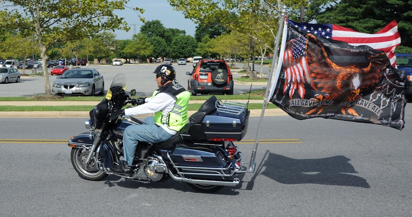 A member of the Patriot Guard departs on the group ride at the Joint Base Andrews Motorcycle Safety Day here July 15.  The event was part of and Air Force-wide effort to educate riders and minimize accidents. (U.S. Air Force photo by Senior Airman Torey Griffith)