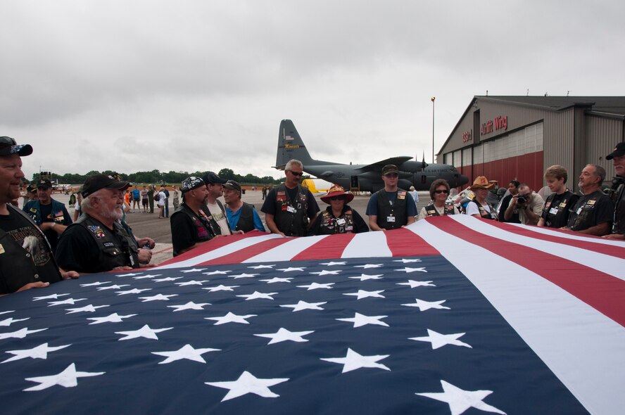 During the opening ceremony of the 133rd Airlift Wing 2011 Air Expo members of the Patriot Guard Riders held the colors. The Air Expo, which was highlighted by the Para-Commandos and the U.S. Air Force Honor Guard Drill Team was the first to be held at the Wing in fifteen years and celebrated the Minnesota Air Guard?s 90 years of service. (U.S. Air Force photo by Tech. Sgt. Erik Gudmundson)