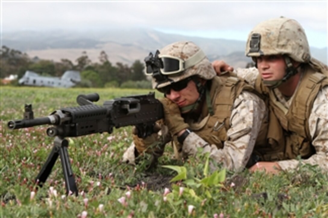 Lance Cpl. Kevin A. Kohl (left) and Cpl. Daniel T. Conroy provide security at Marine Medium Helicopter Squadron 268's forward arming and refueling point at Camp San Luis Obispo during the 11th Marine Expeditionary Unit's large-scale exercise with ocean and urban-based scenarios on July 12, 2011.  Kohl and Conroy both serve as low-altitude air defense gunners with the reinforced squadron, which is the aviation combat element for the unit.  