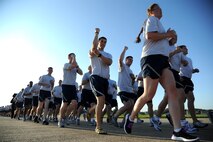 KUNSAN AIR BASE, Republic of Korea -- Members of the 8th Fighter Wing participate in the Warrior Run here July 19. The mission of the 8th FW is to defend the base, accept follow-on forces and take the fight north. (U.S. Air Force photo/Staff Sgt. Rasheen A. Douglas)