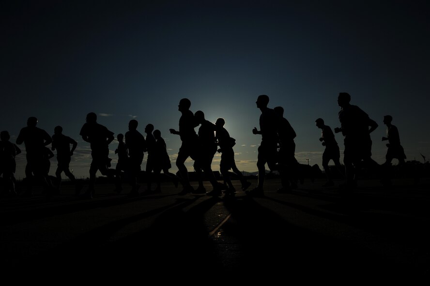 KUNSAN AIR BASE, Republic of Korea -- Members of the 8th Fighter Wing participate in the Warrior Run here July 19. The mission of the 8th FW is to defend the base, accept follow-on forces and take the fight north. (U.S. Air Force photo/Staff Sgt. Rasheen A. Douglas)