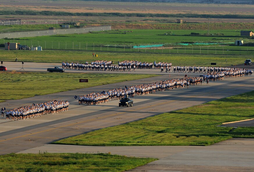 KUNSAN AIR BASE, Republic of Korea -- Members of the 8th Fighter Wing participate in the Warrior Run here July 19. The mission of the 8th FW is to defend the base, accept follow-on forces and take the fight north. (U.S. Air Force photo/Senior Airman Ciara Wymbs)
