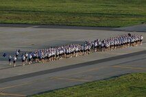 KUNSAN AIR BASE, Republic of Korea -- Members of the 8th Fighter Wing participate in the Warrior Run here July 19. The mission of the 8th FW is to defend the base, accept follow-on forces and take the fight north. (U.S. Air Force photo/Senior Airman Ciara Wymbs)