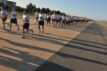 KUNSAN AIR BASE, Republic of Korea -- Members of the 8th Fighter Wing participate in the Warrior Run here July 19. The mission of the 8th FW is to defend the base, accept follow-on forces and take the fight north. (U.S. Air Force photo/Senior Airman Brittany Y. Bateman) 

