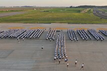 KUNSAN AIR BASE, Republic of Korea -- The leadership and members of wing staff agencies from the 8th Fighter Wing lead the way during the Warrior Run here July 19. The wing staff functions include the director of staff, 8th Comptroller Squadron, Plans, History, Legal, Chaplain, Safety, Command Post, Arms Control, Inspector General, Equal Opportunity , Public Affairs, Protocol and the Sexual Assault Response Coordinator. (U.S. Air Force photo/Senior Airman Brittany Y. Bateman)
 

