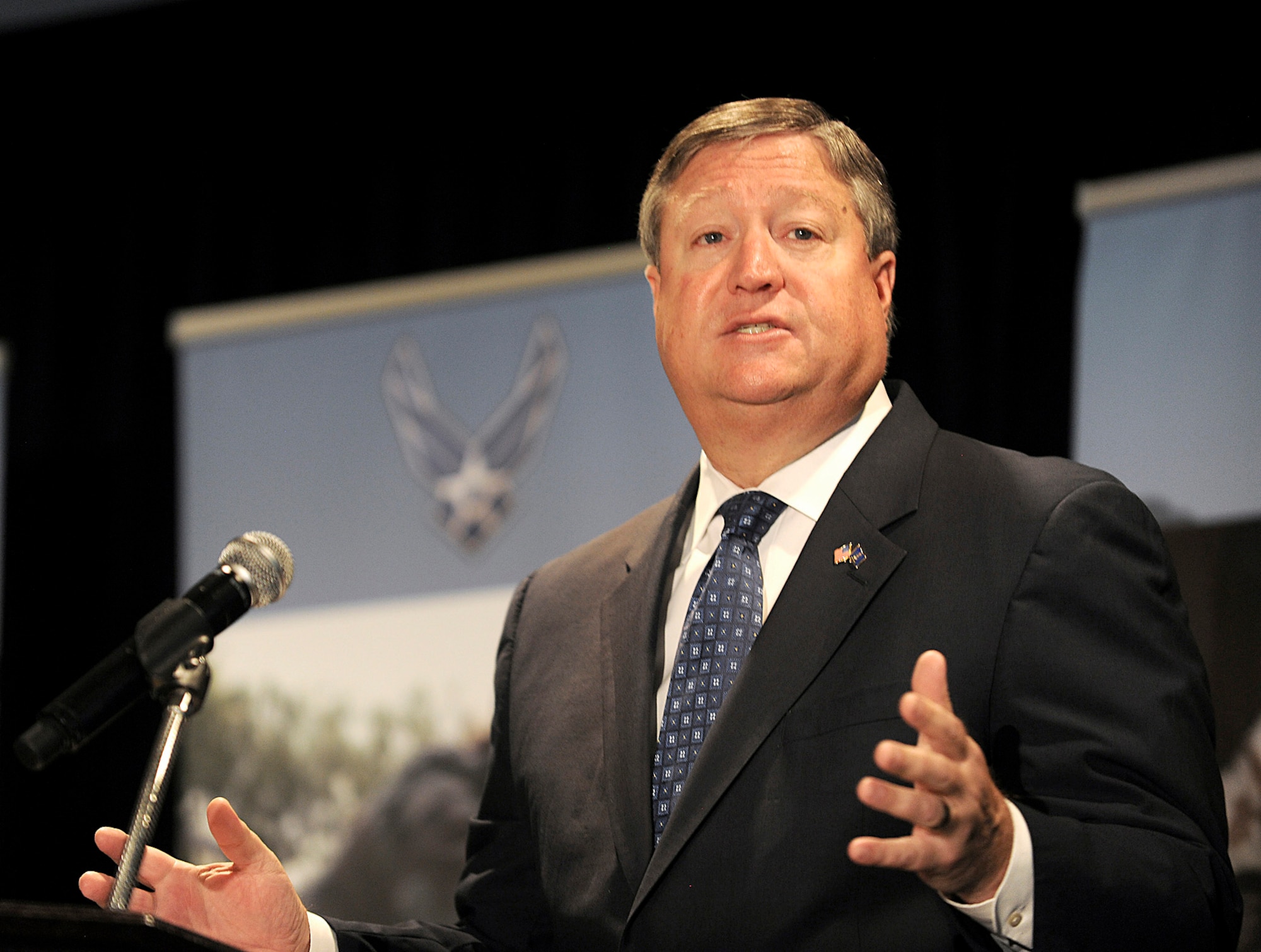 Secretary of the Air Force Michael Donley speaks to attendees at the Caring for People forum July 19, 2011, in Arlington, Va. The three-day forum brings Air Force professionals from across the service together to discuss ways to improve support programs and services available to Airmen and their extended families. (U.S. Air Force photo/Scott M. Ash)