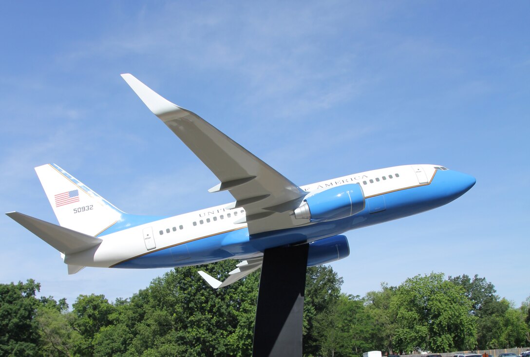 A scale model C-40 rests on its perch outside the 932nd Operations  Group building.  The model has  a 16-foot wing span and weighs  250 pounds.  The project took more than a year to design, procure and deliver to the 932nd Airlift Wing. The 932nd AW provides first-class airlift for congressional and military leaders. (U.S. Air Force photo/Maj. Stan Paregien. 