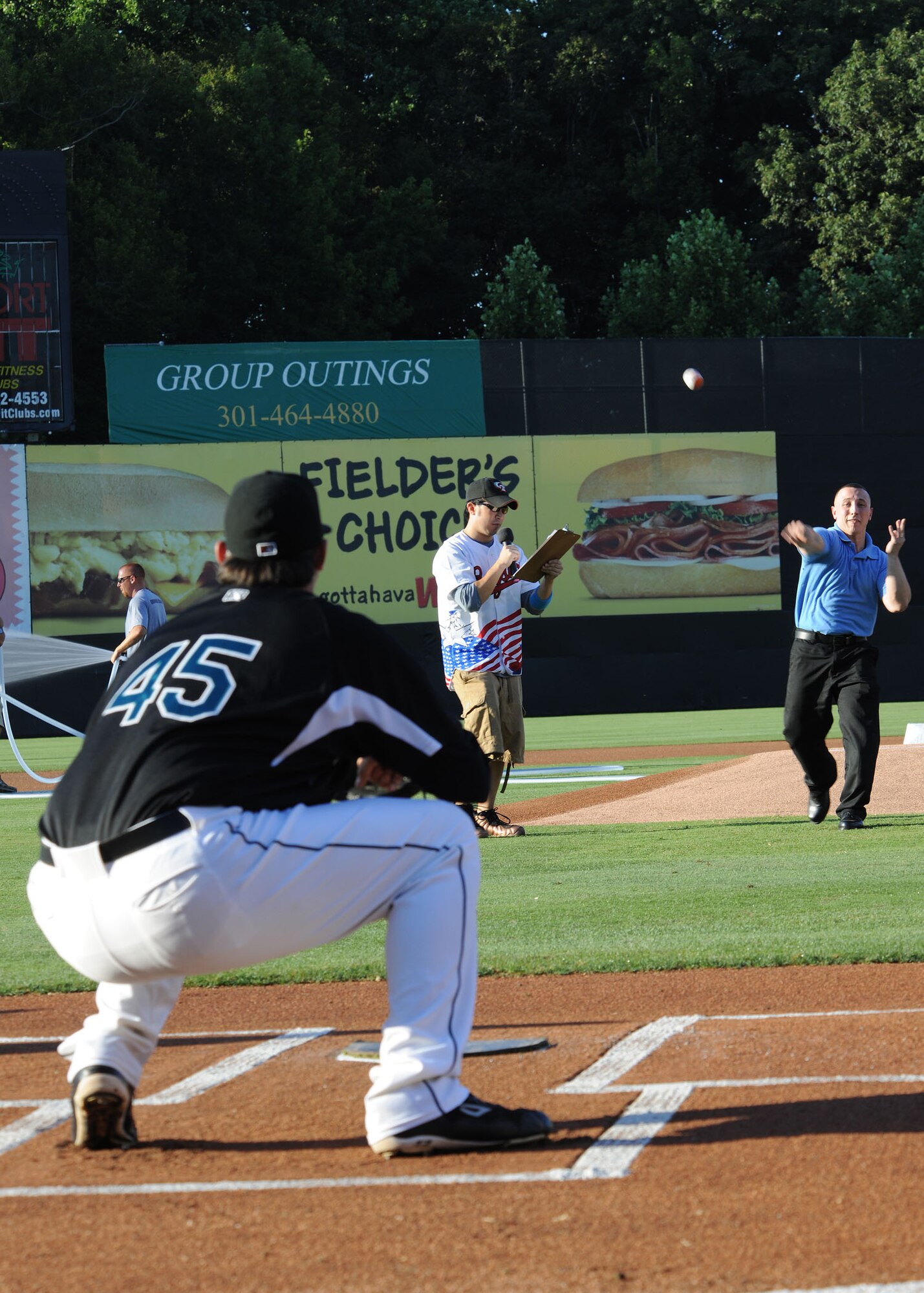 Marine Sergeant Michael Decamilla, Marine Transport Detachment adminstrator chief, throws out one of the first pitches of the Bowie Baysoxs baseball game against the Richmond Flying Squirrels at the Prince George's Stadium July 15. The Bowie Baysoxs hosted Joint Base Andrews night at their sporting event to show their appreciation for the military community.( U.S. Air Force photo/ Senior Airman Matt Coleman-Foster)