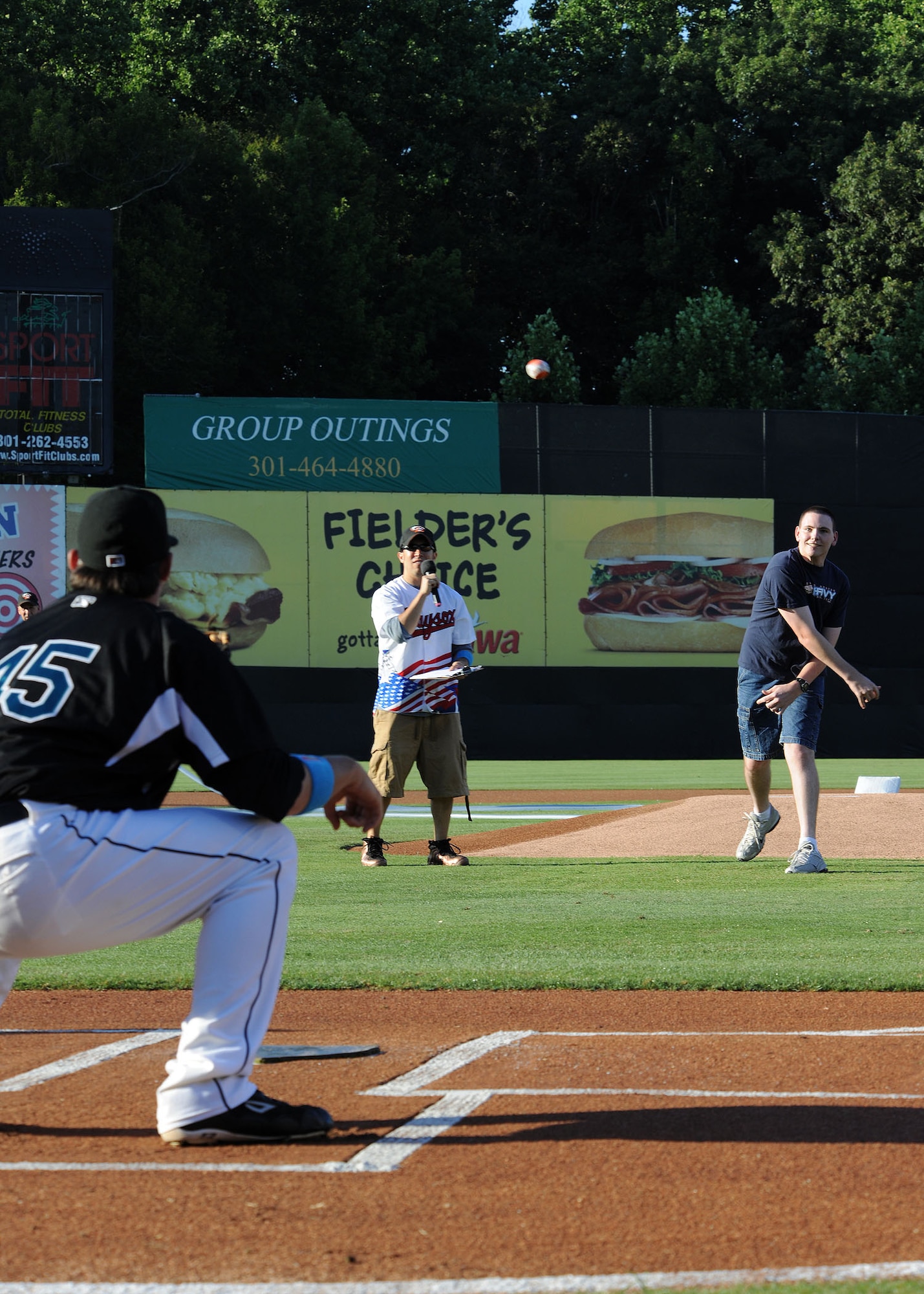 Navy Hospitalman Anthony Easterling ,Naval Air Facility Washington, throws out one of the first pitches of the Bowie Baysox baseball game against the Richmond Flying Squirrels at the Prince George's Stadium July 15. The Bowie Baysox hosted Joint Base Andrews night at their sporting event to show their appreciation for the military community.( U.S. Air Force photo/ Senior Airman Matt Coleman-Foster)
