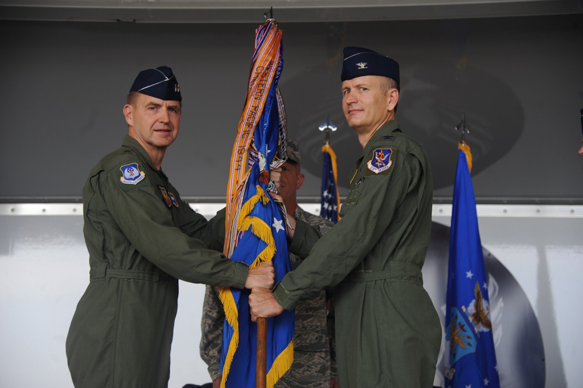 New commander

U.S. Air Force Maj. Gen. Stephen Hoog, 9th Air Force commander, passes the guidon to Col. Billy Thompson, incoming 23rd Wing commander, during a change of command ceremony at Moody Air Force Base, Ga., July 19, 2011. Prior to assuming command of the wing, Thompson served as 563rd Rescue Group commander at Davis-Monthan, Ariz. (U.S. Air Force photo by Airman 1st Class Paul Francis/Released)

 
