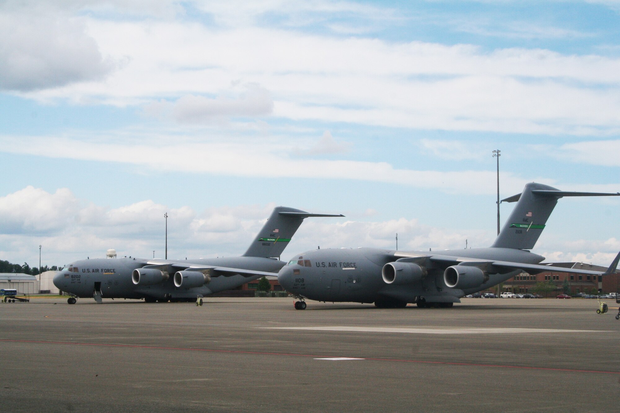 C-17 Globemaster III aircraft from the 62nd Airlift Wing at Joint Base Lewis-McChord, Wash., are parked on the flightline at the base on July 18, 2011. The C-17 is one of the aircraft that will be used for Air Mobility Rodeo 2011. Rodeo, sponsored by the Air Mobility Command, is the Mobility Air Force's (MAF) readiness competition. This competition focuses on improving our worldwide air mobility forces' professional core abilities. Air Mobility 2011 will be held at McChord Field, Wash., July 24-29, 2011. More than 150 teams and 3,000 people from the Air Force, and Air Force Reserve, as well as allied nations, are expected to participate. (U.S. Air Force Photo/Master Sgt. Scott T. Sturkol)