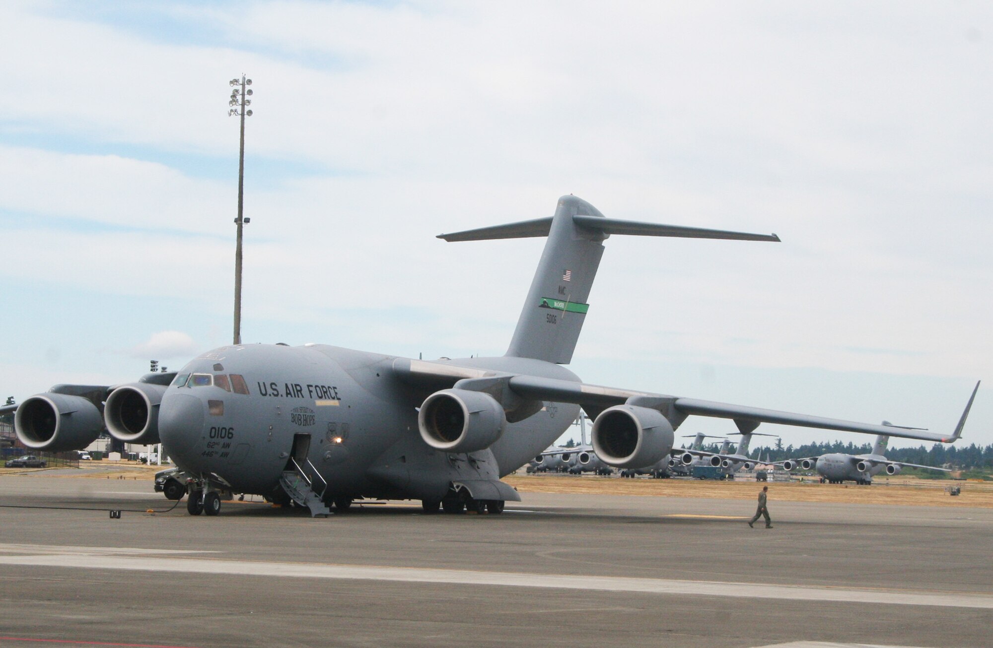 A C-17 Globemaster III from the 62nd Airlift Wing at Joint Base Lewis-McChord, Wash., is parked on the flightline at the base on July 18, 2011. The C-17 is one of the aircraft that will be used for Air Mobility Rodeo 2011. Rodeo, sponsored by the Air Mobility Command, is the Mobility Air Force's (MAF) readiness competition. This competition focuses on improving our worldwide air mobility forces' professional core abilities. Air Mobility 2011 will be held at McChord Field, Wash., July 24-29, 2011. More than 150 teams and 3,000 people from the Air Force, and Air Force Reserve, as well as allied nations, are expected to participate. (U.S. Air Force Photo/Master Sgt. Scott T. Sturkol)