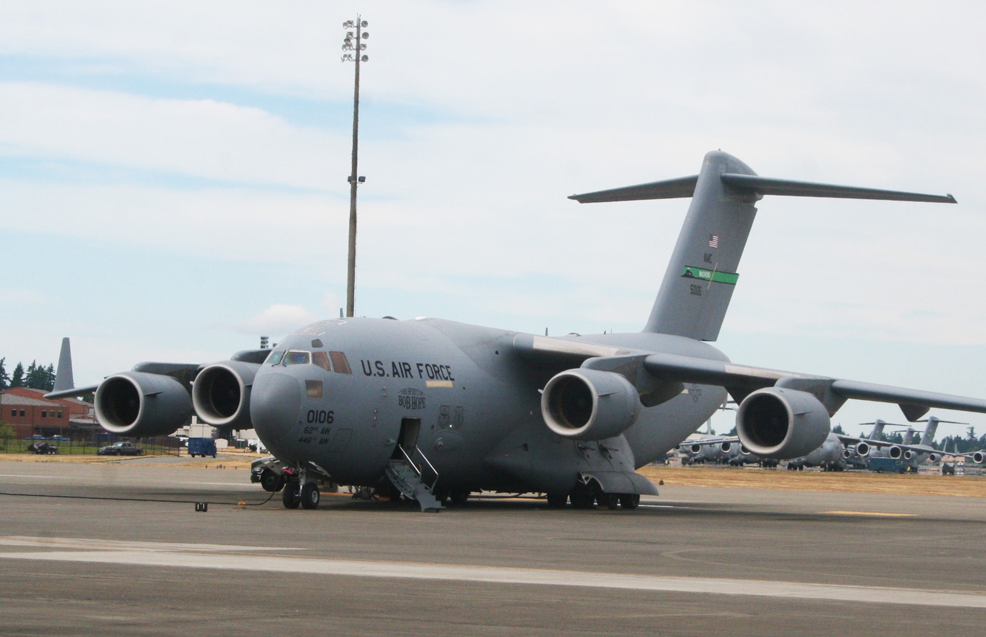 A C-17 Globemaster III from the 62nd Airlift Wing at Joint Base Lewis-McChord, Wash., is parked on the flightline at the base on July 18, 2011. The C-17 is one of the aircraft that will be used for Air Mobility Rodeo 2011. Rodeo, sponsored by the Air Mobility Command, is the Mobility Air Force's (MAF) readiness competition. This competition focuses on improving our worldwide air mobility forces' professional core abilities. Air Mobility 2011 will be held at McChord Field, Wash., July 24-29, 2011. More than 150 teams and 3,000 people from the Air Force, and Air Force Reserve, as well as allied nations, are expected to participate. (U.S. Air Force Photo/Master Sgt. Scott T. Sturkol)