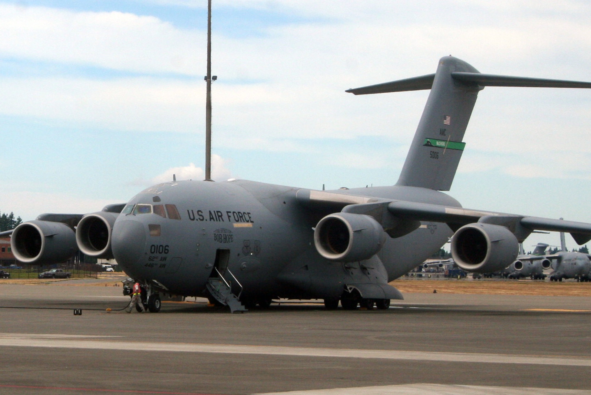 A C-17 Globemaster III from the 62nd Airlift Wing at Joint Base Lewis-McChord, Wash., is parked on the flightline at the base on July 18, 2011. The C-17 is one of the aircraft that will be used for Air Mobility Rodeo 2011. Rodeo, sponsored by the Air Mobility Command, is the Mobility Air Force's (MAF) readiness competition. This competition focuses on improving our worldwide air mobility forces' professional core abilities. Air Mobility 2011 will be held at McChord Field, Wash., July 24-29, 2011. More than 150 teams and 3,000 people from the Air Force, and Air Force Reserve, as well as allied nations, are expected to participate. (U.S. Air Force Photo/Master Sgt. Scott T. Sturkol)