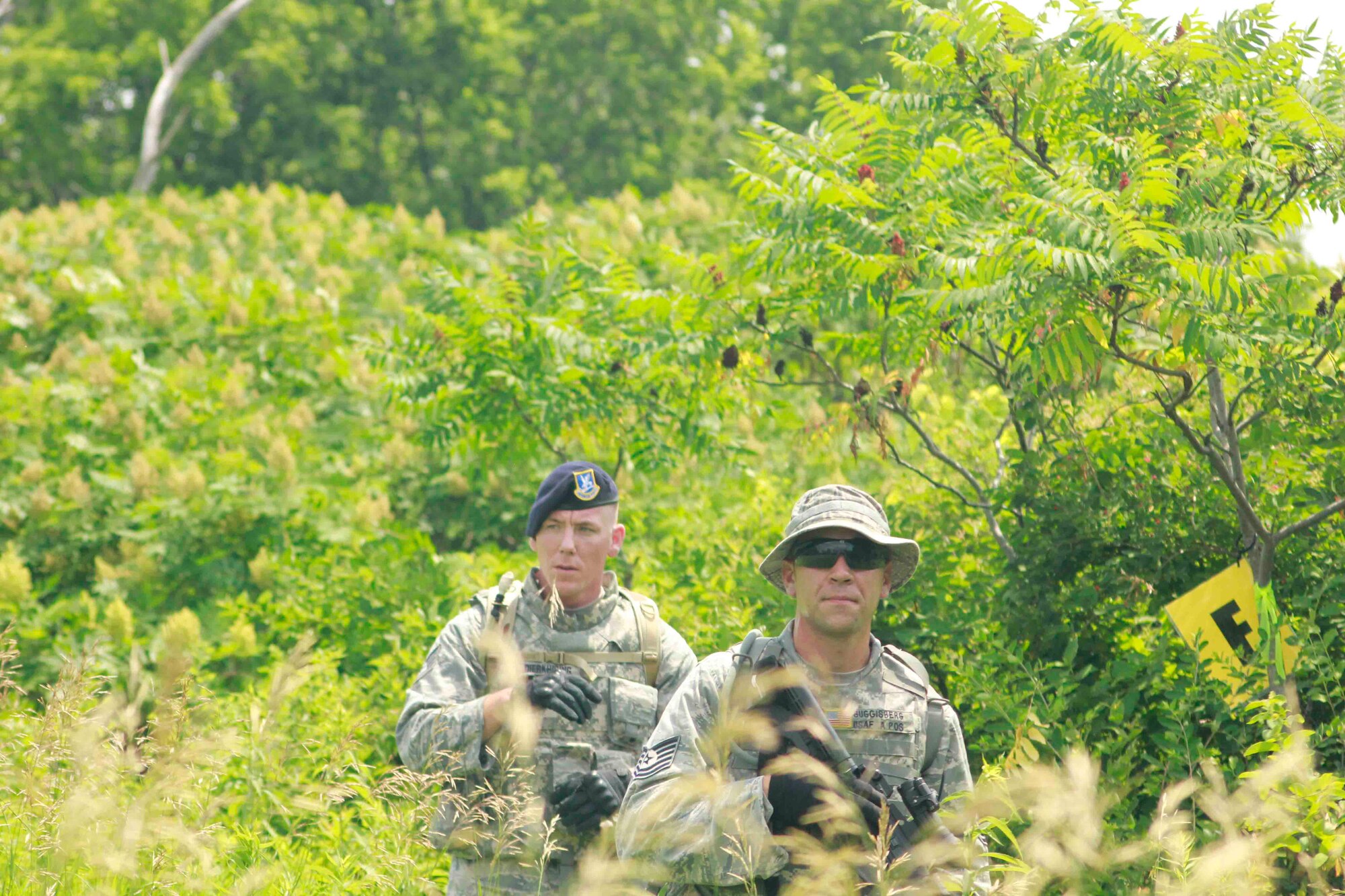 TSgt Justin Guggisberg (front) and TSgt Aric Dierkhising located
objective Foxtrot. (Air Force Photo/Master Sgt. Nicollette Shegstad)
