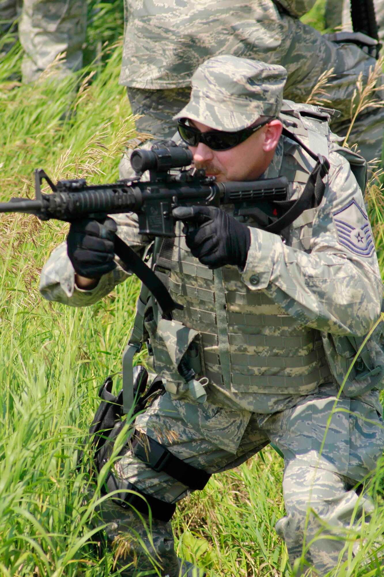 Master Sgt. Carl Herrmann provides rear security during a foot patrol. (Air Force Photo/Master Sgt. Nicollette Shegstad)
