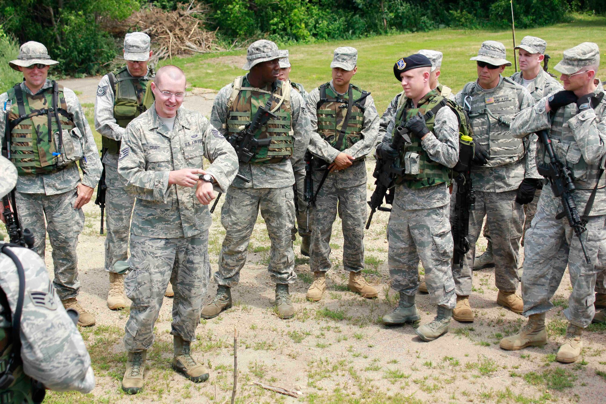 Staff Sgt. Adam Craft, SERE instructor, teaches SF personnel how to determine
cardinal directions by using their wristwatch.  
(Air Force Photo/Master Sgt. Nicollette Shegstad)
