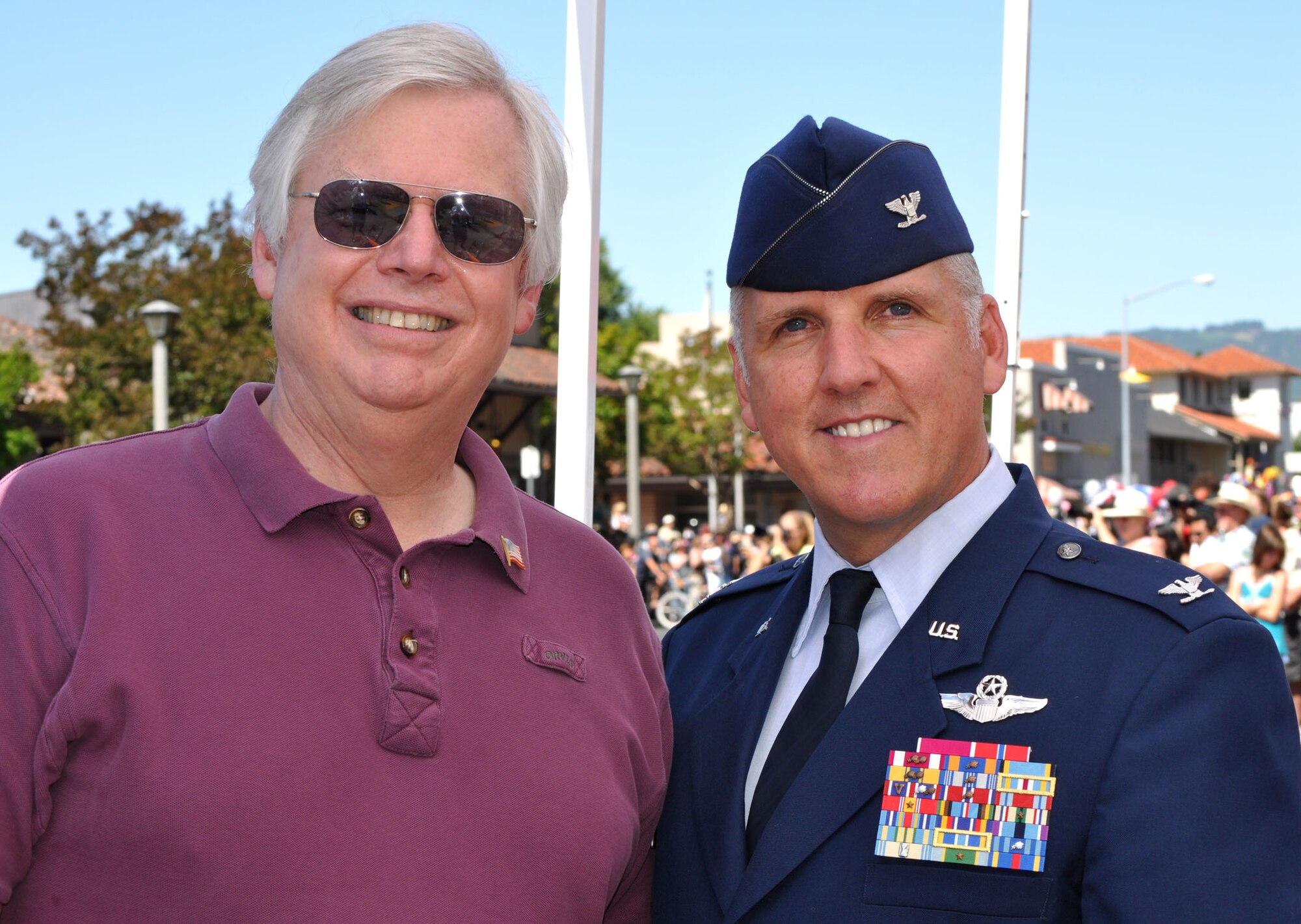 TRAVIS AIR FORCE BASE, Calif.-- 349th AMW Wing Commander, Col. Jay Flournoy, visits with Robert Arnold, grandson of Gen. H. H. "Hap" Arnold, during the annual Sonoma Fourth of July parade and celebration. Robert Arnold is the President and owner of Chandelle Winery, a family owned winery founded in 1986. (U.S. Air Force photo/Senior Master Sgt. Ellen L. Hatfield)